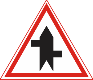 Service road joins the main road first from the right, then from the left